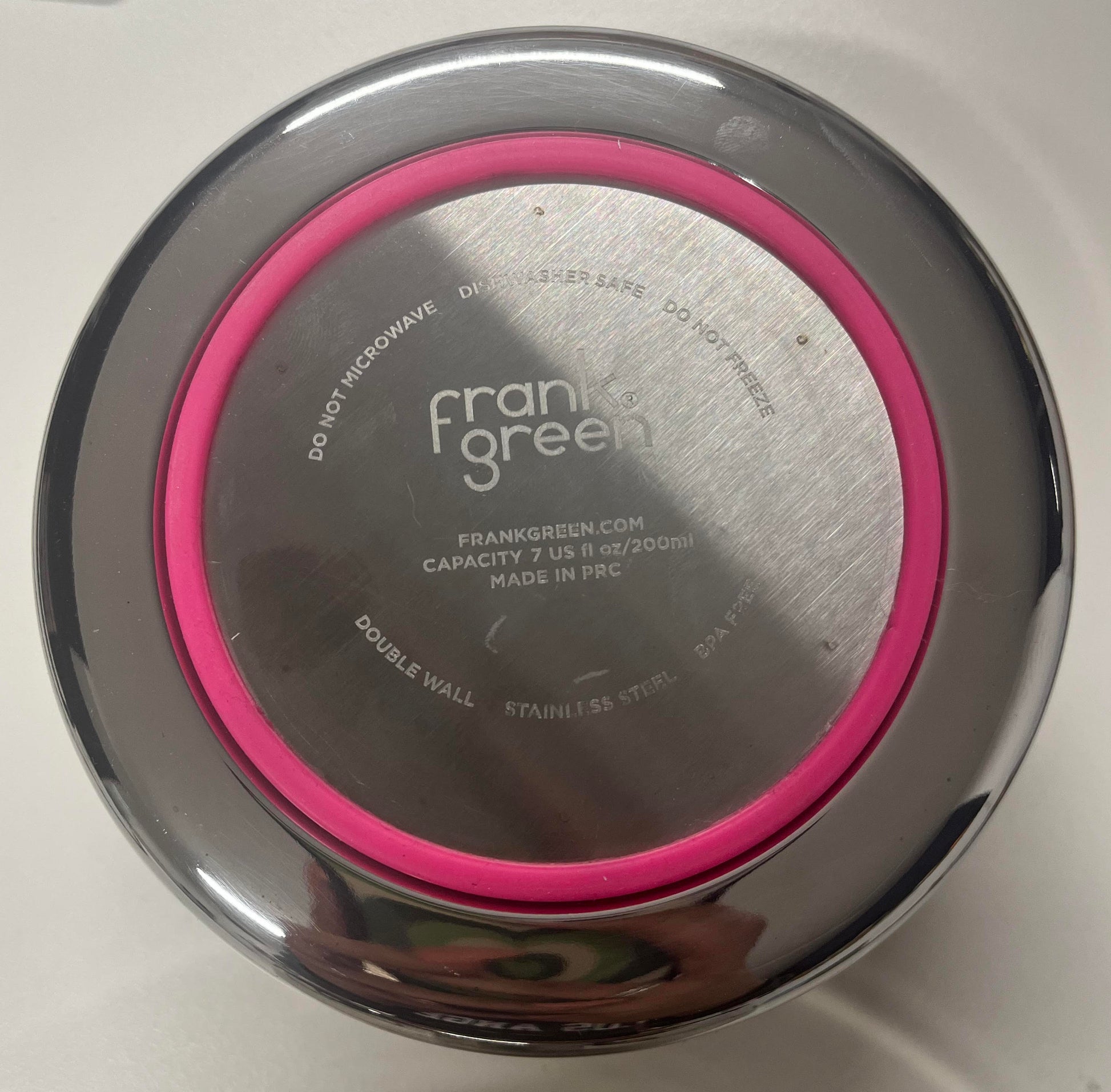 Underside of Frank Green Stainless Steel Pet Bowl with pink non slip ring. Dishwasher Safe, Do Not Microwave, Do Not Freeze, Double Wall, BPA Free
